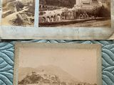 two old black and white photos of a castle and a church