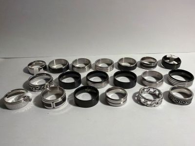 a lot of rings that are sitting on a table