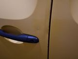 a close up of a door handle on a car