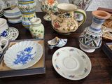 a table with a lot of plates and bowls on it