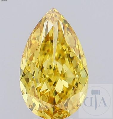 un gros plan d'un diamant jaune sur fond blanc