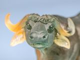 a statue of a bull with horns on it ' s head
