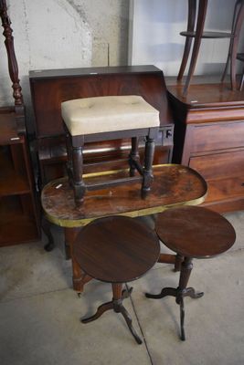 two stools and a table in a room