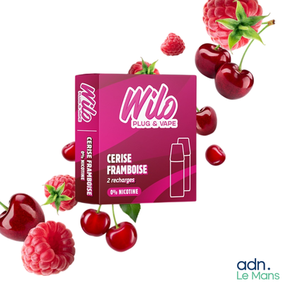 cherries and raspberries scattered around a box of lip butter