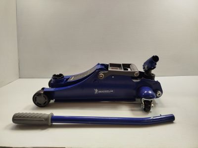 une image représentant un vérin hydraulique bleu sur un fond blanc