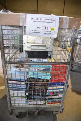 a metal cart with a bunch of books in it