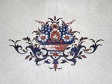 a picture of a tile with a basket of fruit on it