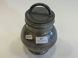 an image of a metal container with a tag on it