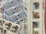 many different stamps in a clear bag on a table