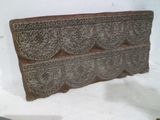 an old wooden box with intricate designs on it