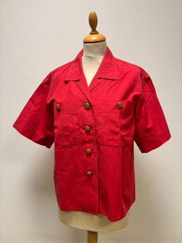Yves SAINT LAURENT - Petite veste en coton rouge, boutons signés....