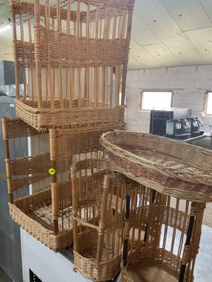 many baskets that are stacked on top of each other