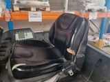 an image of a car seat in the back of a truck