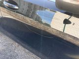 a car that is parked on the side of the street