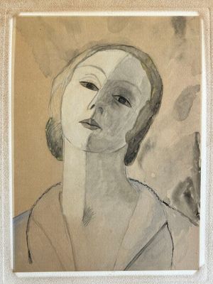 painting of a woman ' s face in a white frame on a wall