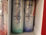 a shelf with several bottles of hand sanitizer on it