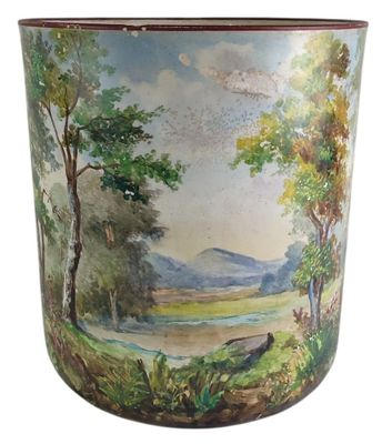 a vase with a painting of a landscape on it