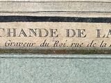 a close up of an old book on a table