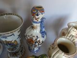 many different vases that are sitting on a table