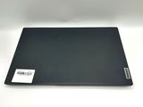 a close up of a black mouse pad on a white surface