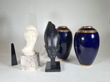 three vases that are sitting next to each other on a table