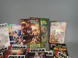 a lot of comic books sitting on a table