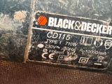 a close up of a black and decker sign on the side of a vehicle
