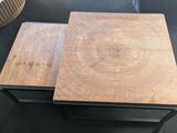 two wooden tables with metal legs and a wooden table top
