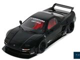 the toy car is black and has a red stripe on it