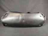 black leather handbag with rivets and rivets