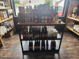 many bottles of alcohol on the shelves in the store