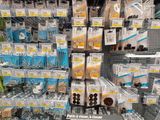 a display of pens and pencils for sale in a store