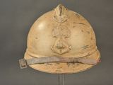 an old fireman ' s helmet on a metal stand on a gray background