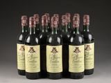 six bottles of wine are lined up in a row
