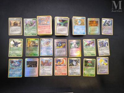 the pokemon cards are lined up on a black surface
