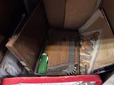 a box full of musical instruments sitting on the floor