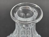 a clear glass vase that is sitting on a table