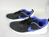 black and blue running shoes on a white surface