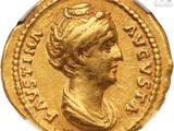 a gold coin with an image of a woman wearing a crown on it