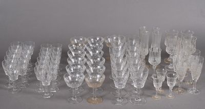 a lot of wine glasses that are sitting on a table