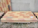 several pieces of wood sitting on top of a wooden pallet