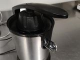 a juicer that is sitting on the counter in the kitchen