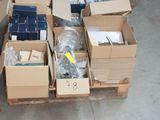 many boxes of assorted items sitting on a pallet