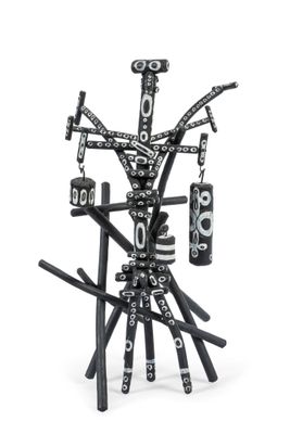 a black and white sculpture of a tree made out of sticks