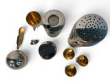many different types of kitchen utensils on a white surface