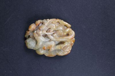 a small piece of food that is on a black surface