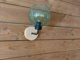 a light that is attached to a wooden wall