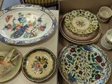 many plates and bowls in a box on the table