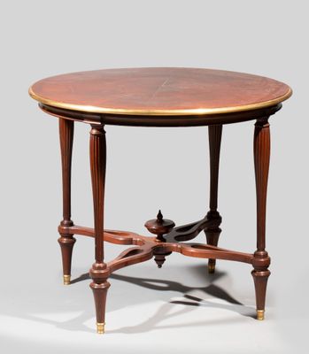 une table ronde avec deux pieds et un plateau en bois