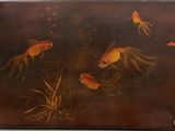 une image représentant un tableau de poissons rouges dans un étang